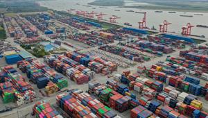 China's November exports and imports shrink further, worse than forecasts