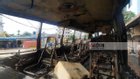 A bus was burnt to ashes by cigarette fire