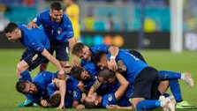Italy becomes first team to advance to knockout phase