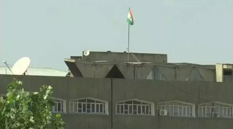 Jammu and Kashmir state flag was taken off the Civil Secretariat building in Srinagar on Sunday,Photo: Collected